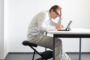 Guy with tablet at desk